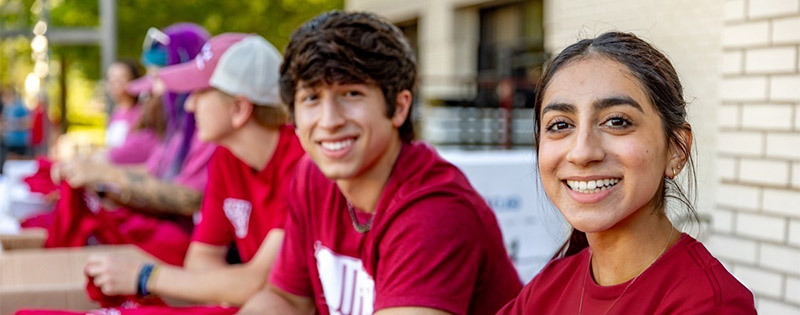 Students look into the camera