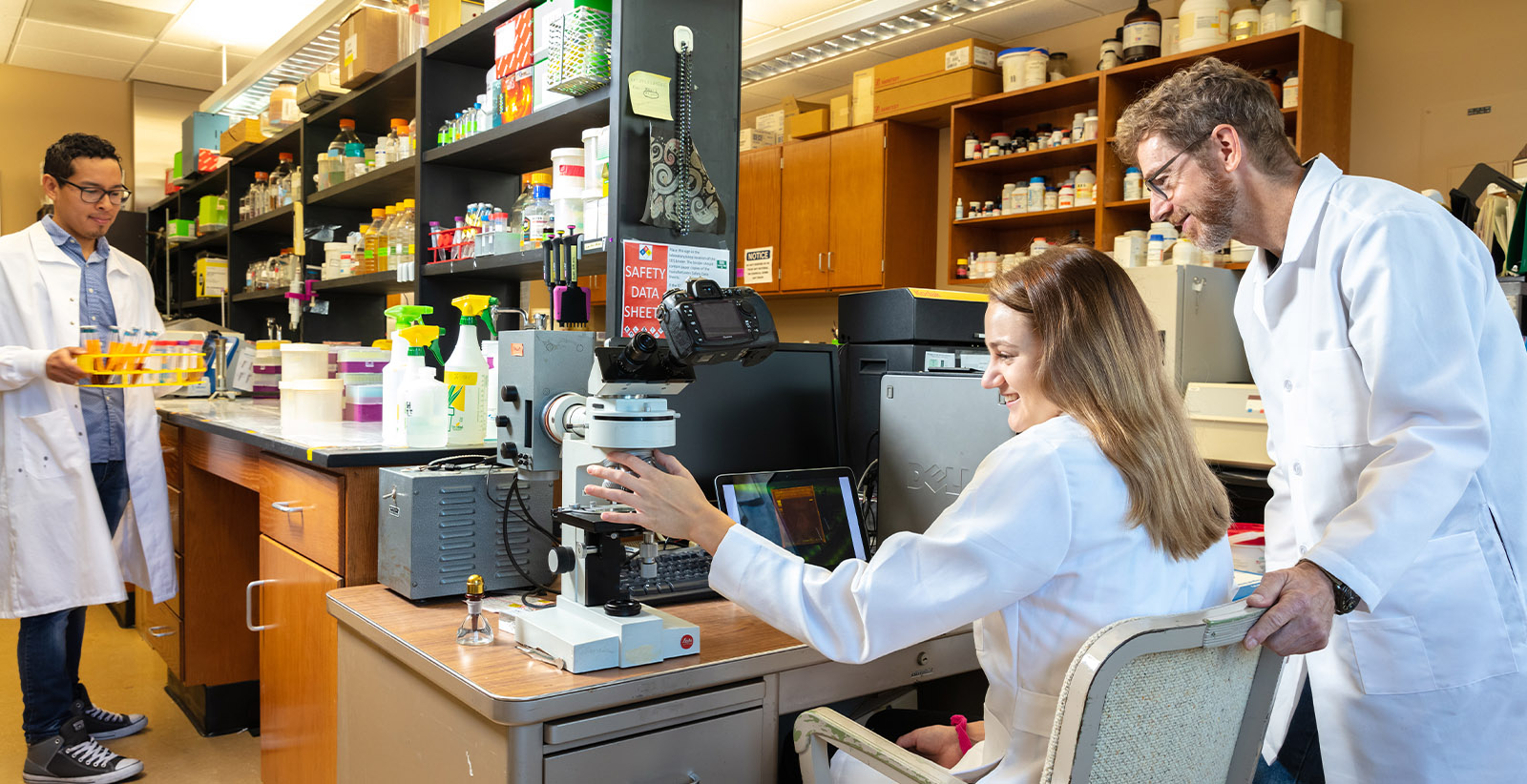 Students perform research in a lab