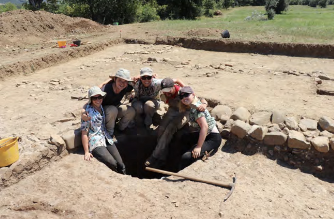 Dr. Rhodora Vennarucci with students at a dig site.