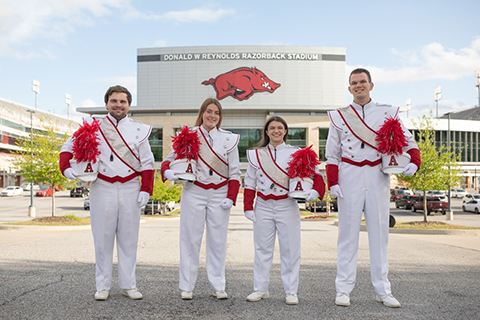 Sallie Hendrix from Paragould, William Rowe from Conway, Jenna Wheeler of Van Buren and Doug Harnish of Sapulpa, Oklahoma, have been selected as this year’s drum majors.
