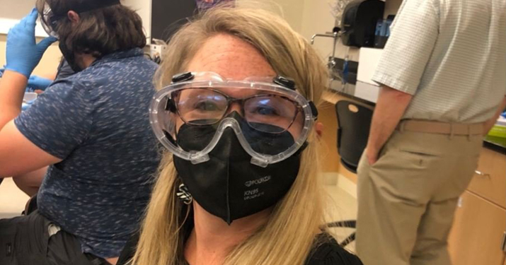 Professor Casey Kayser participates in a lab exercise at the NEH Institute on “Pandemics in History, Literature, and Today.” 